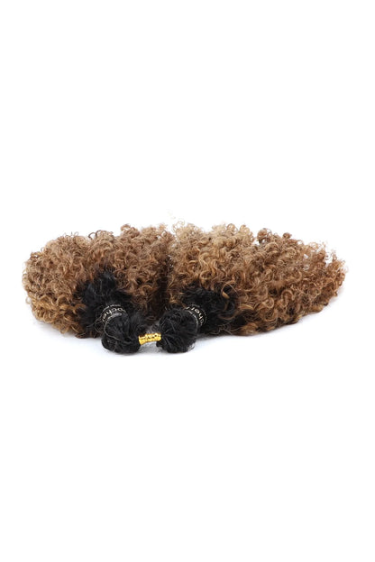 Detail of the ends of 1b30 two tone color tight curly feather crochet human hair