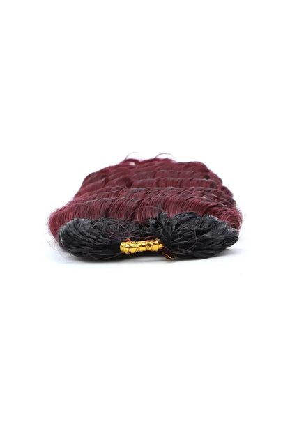 Detail of the ends of T1B/Burgundy 99J deep wave feather crochet human hair